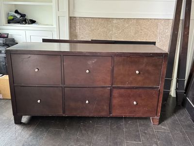 Dark wood lowboy dresser