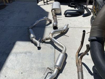 OEM cat back exhaust Chev Silverado 6.2 L. Less than 1k on system.