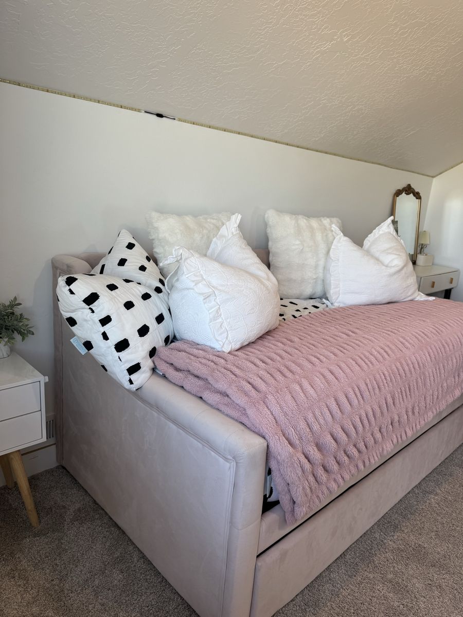 Monarch Hill Ambrosia upholstered twin day bed with trundle.