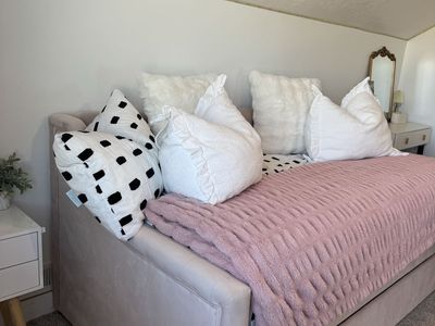 Monarch Hill Ambrosia upholstered twin day bed with trundle.