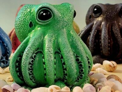 Octopi, succulent, air plant, pens, brush, trinket