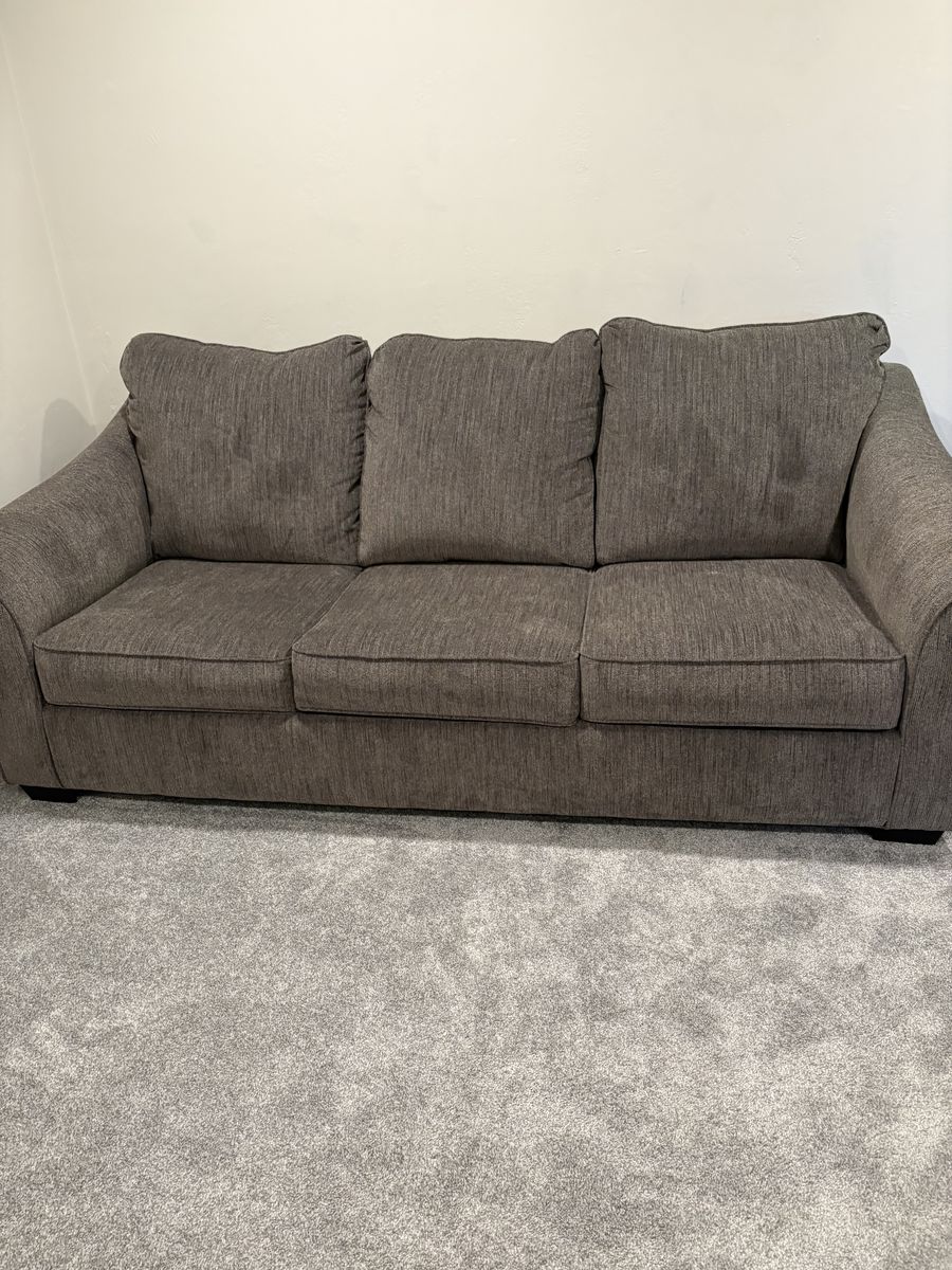 BRAND NEW ASHLEY!!! Gray Fabric 3-Seater Sleeper Sofa - Great for Guest Rooms