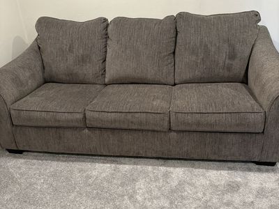 BRAND NEW ASHLEY!!! Gray Fabric 3-Seater Sleeper Sofa - Great for Guest Rooms
