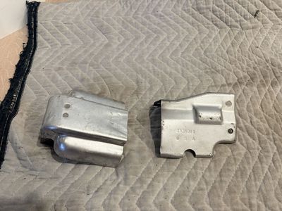 Pair of metal EGR heat shields removed from a 2012 Ram with a 6.7L Cummins diesel