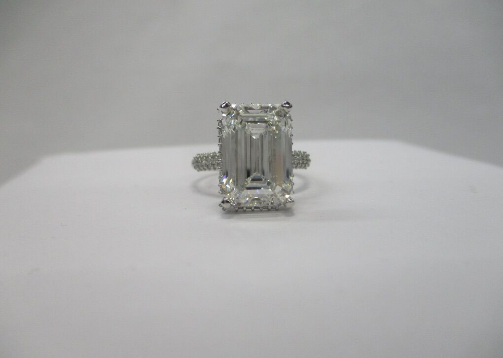 6 Carat Emerald Cut, Diamond And Platinum Ring