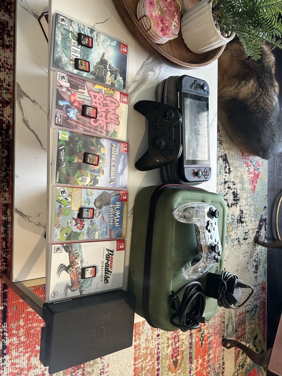 Nintendo Switch + Games and controllers