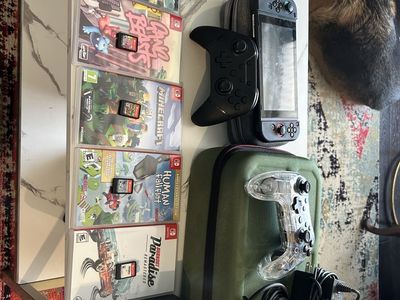 Nintendo Switch + Games and controllers