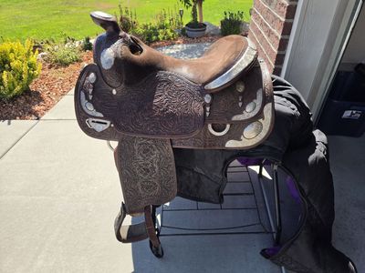 Western Brown Leather Saddle with Floral Tooling and Silver Accents