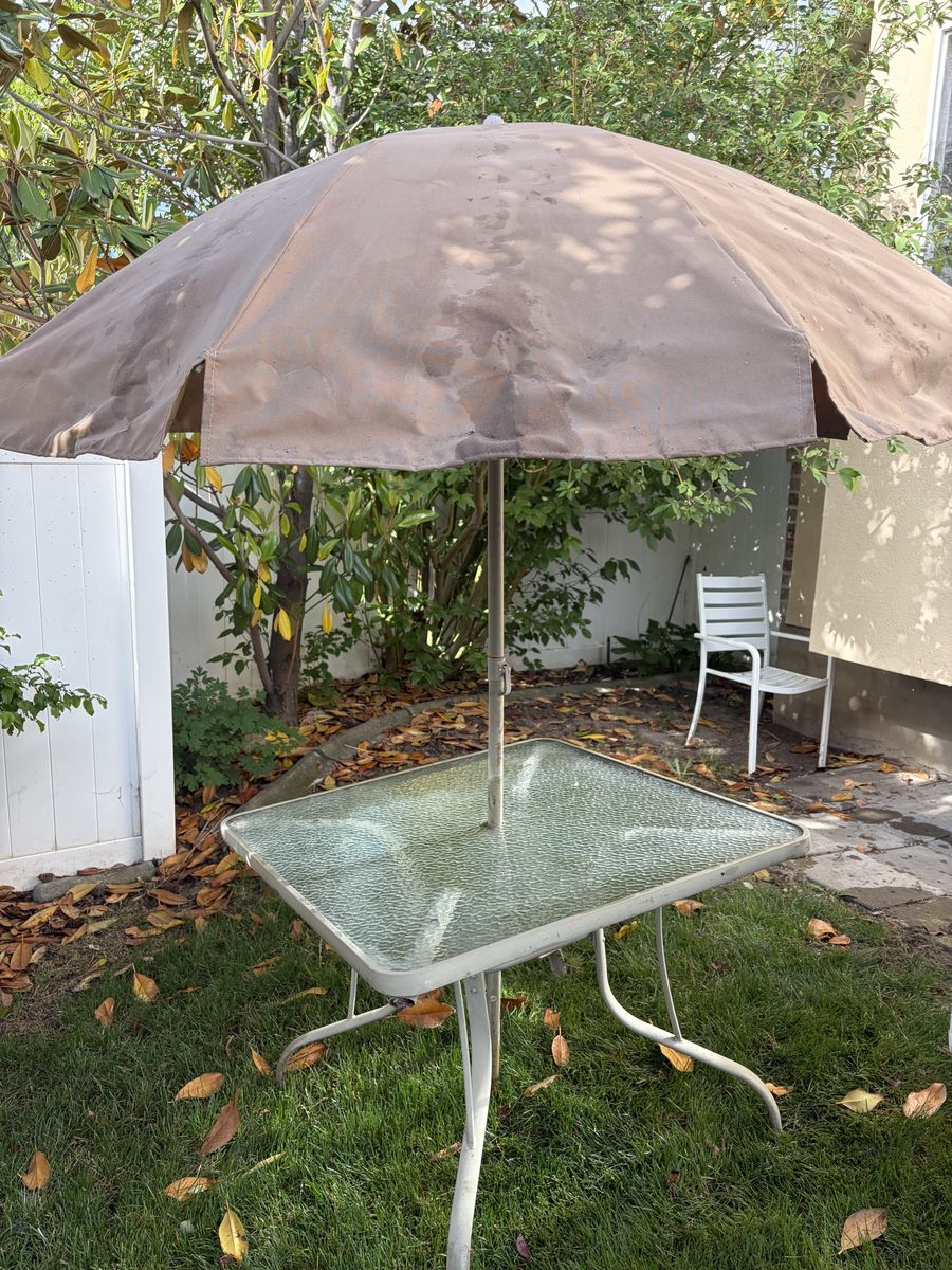 Patio table, umbrella, chairs