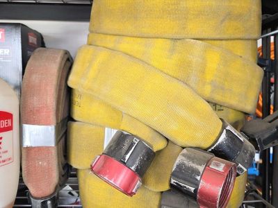 Yellow Fire Hose with Couplings - Used Firefighting Equipment