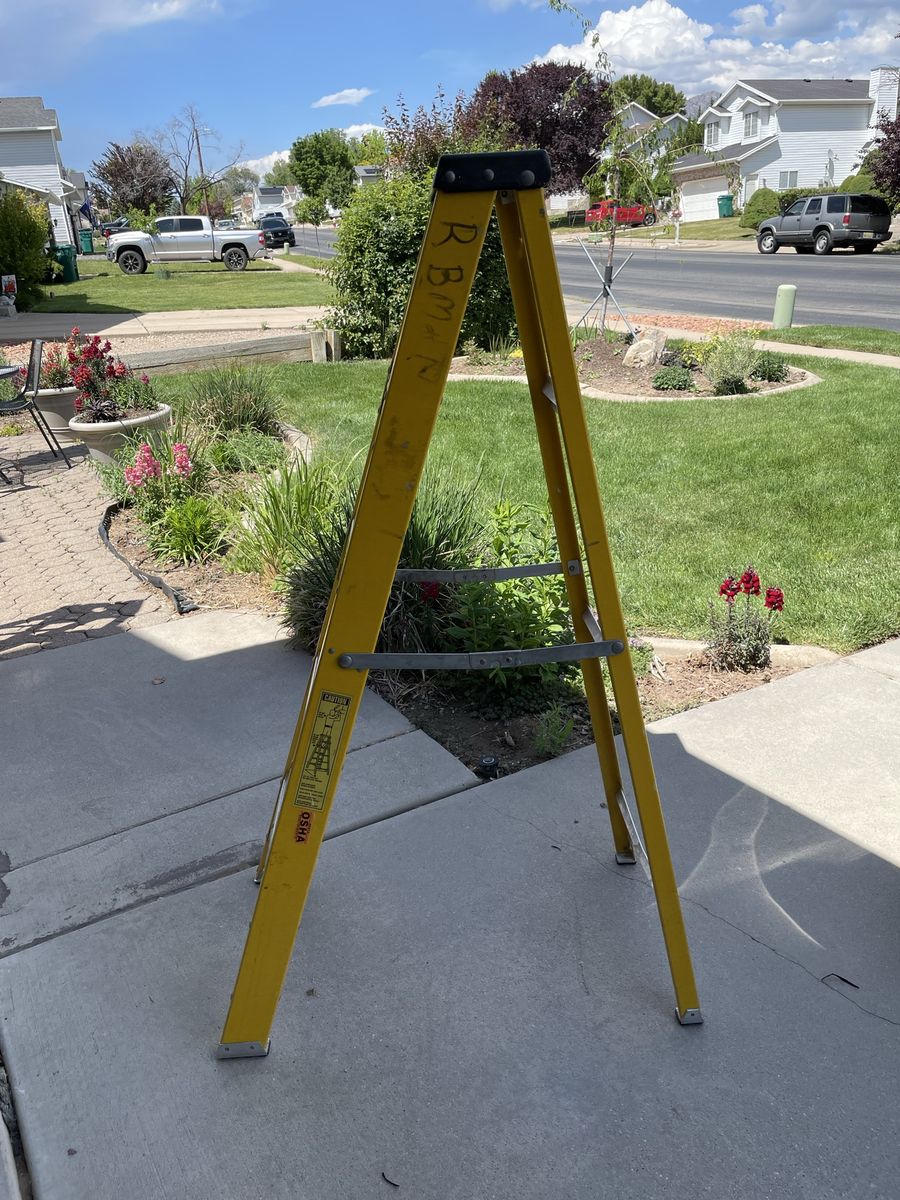 Located in West Jordan - Louisville 4-Foot Fiberglass Step Ladder
