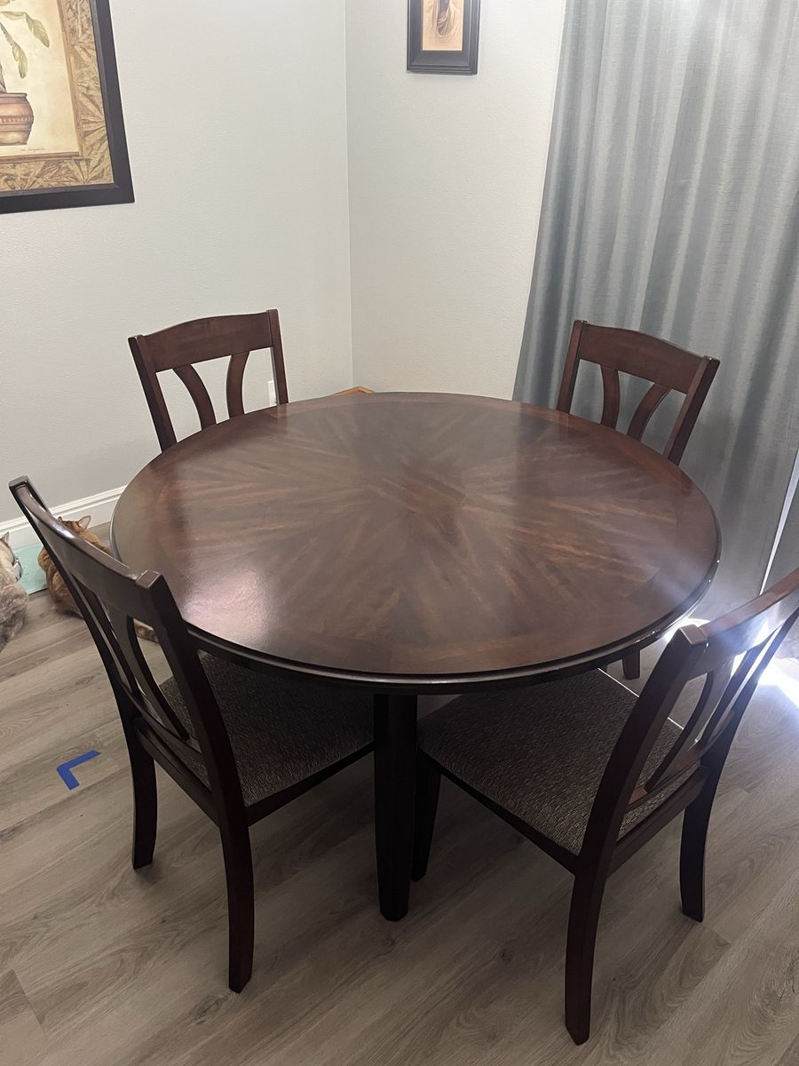 Circular dining table