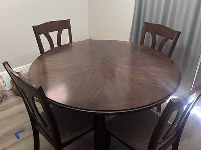 Circular dining table