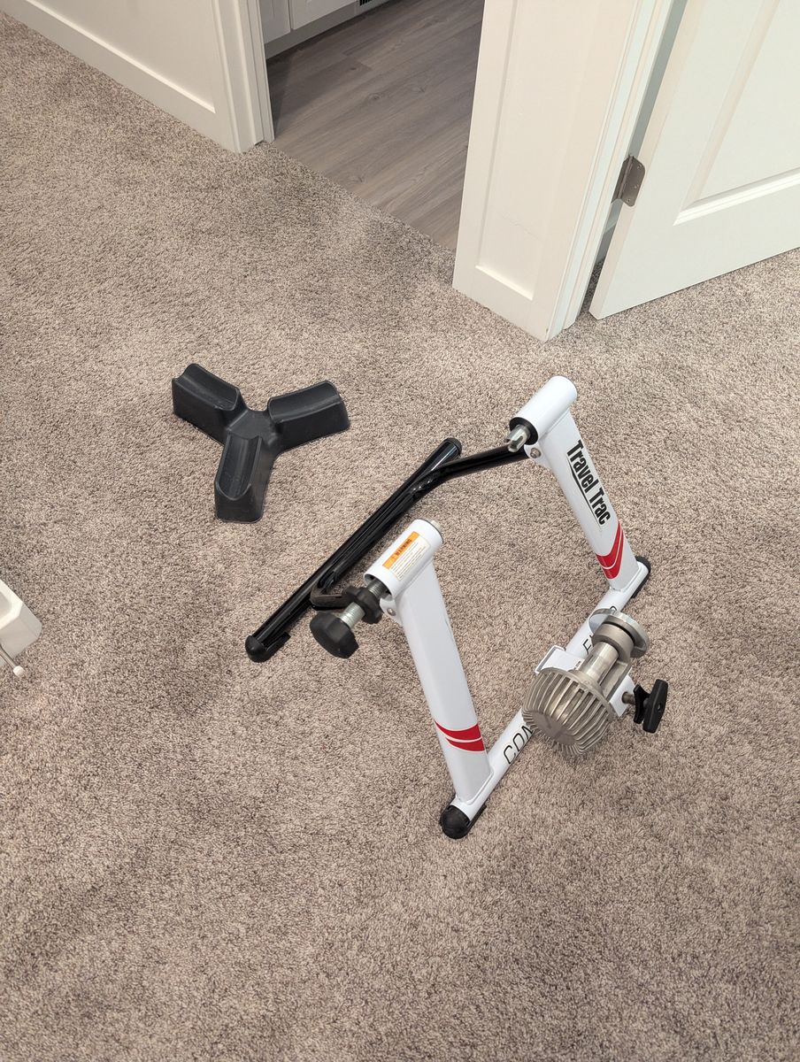 Travel Trac Comp Fluid Stationary Bike Trainer - with 3-Level Riser Block