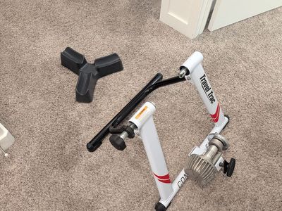 Travel Trac Comp Fluid Stationary Bike Trainer - with 3-Level Riser Block