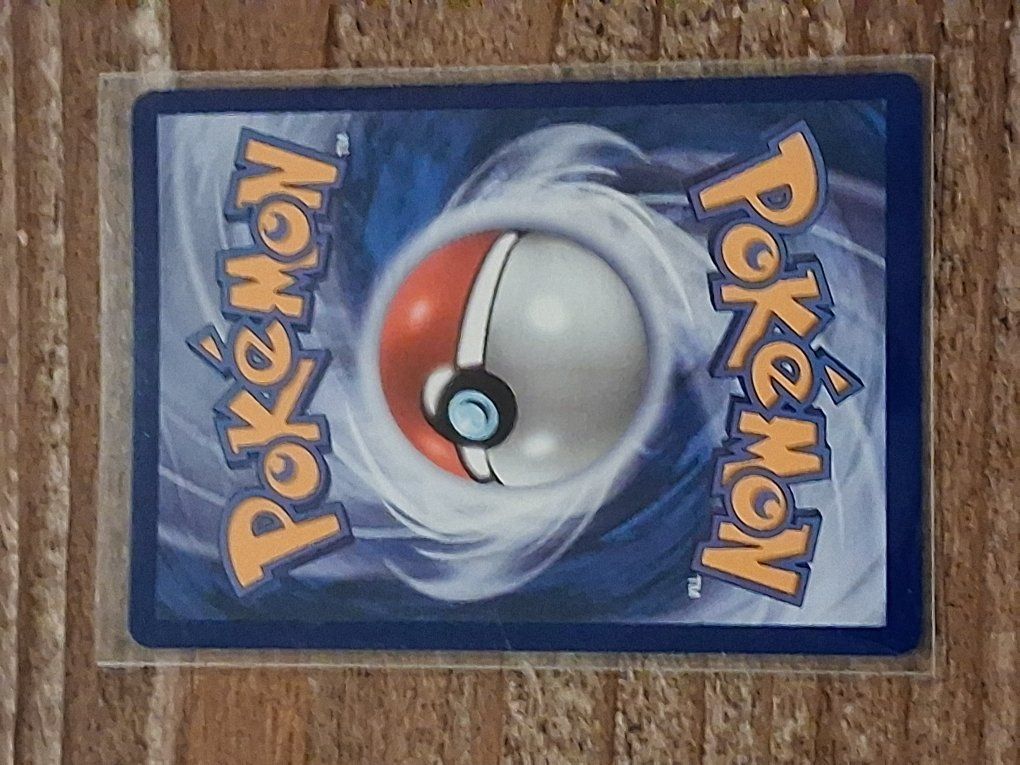 Facing her Pokémon card