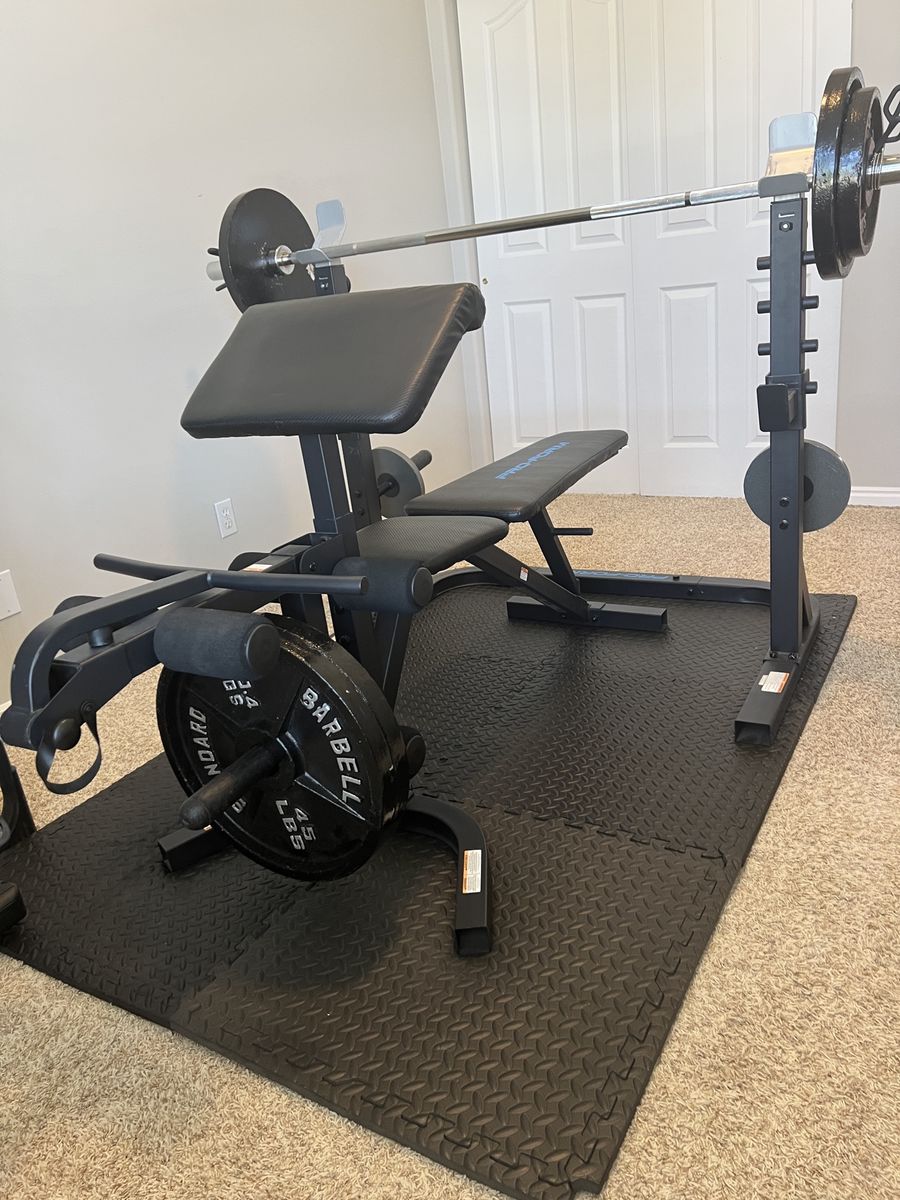 Golds Gym XRS 20 Olympic Workout Bench with Squat Rack & Preacher Curl Pad