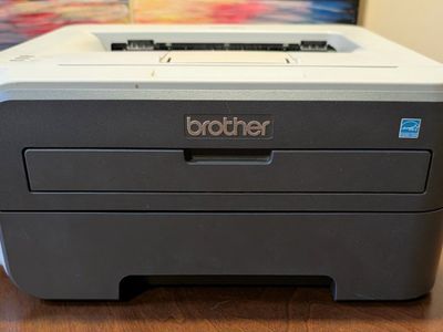 Brother HL-2140 Printer with NEW toner and an extra E-Z Ink Toner Cartridge