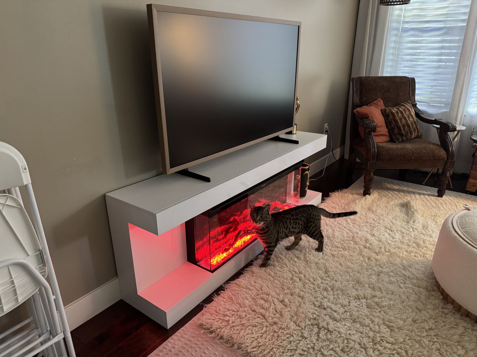 Electric fireplace and white mantel from Home Depot