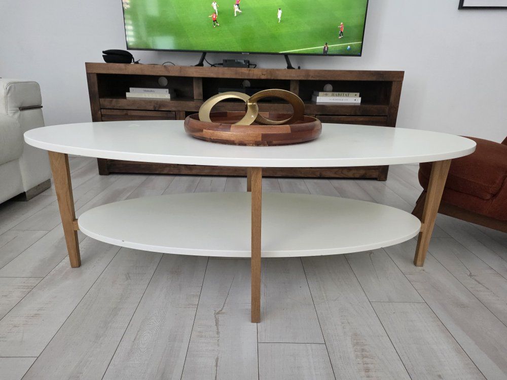 Mid-Century Modern White Oval Coffee Table with Wood Legs and Storage Shelf