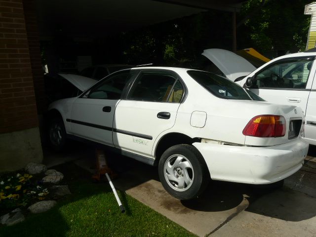 matching set of four 1999 honda civic factory alloy rims and tires