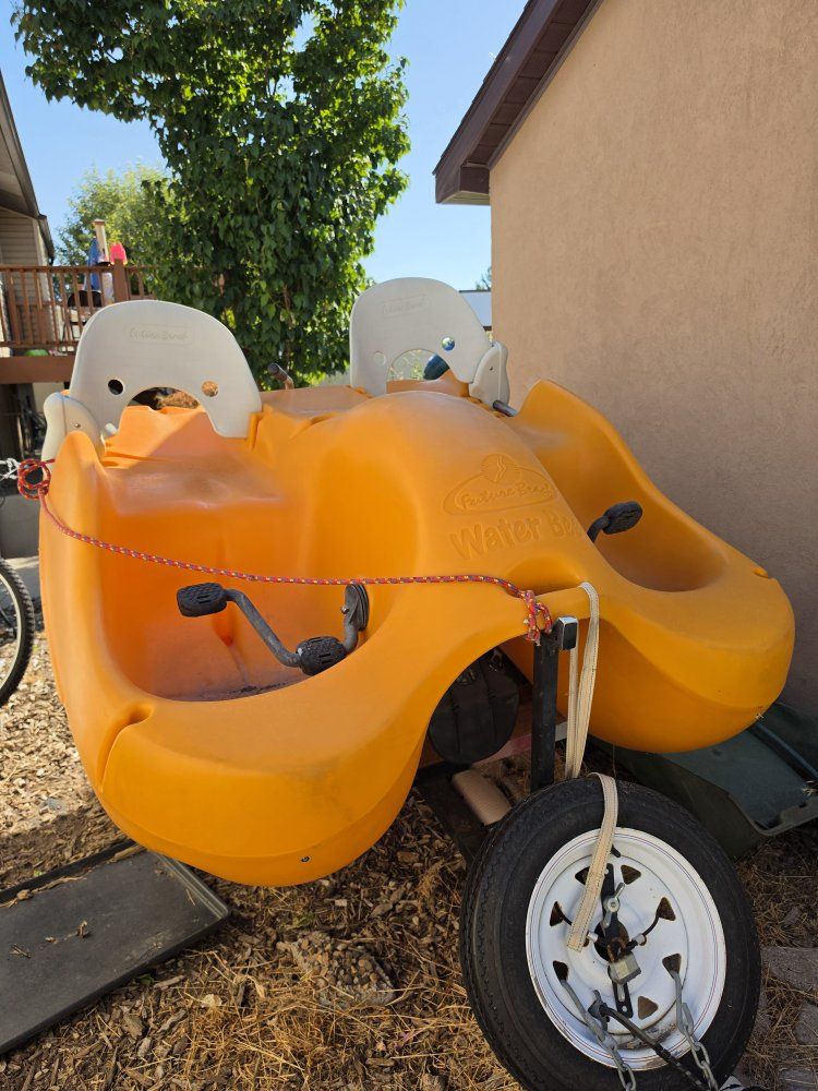 4-person paddle boat with trailer