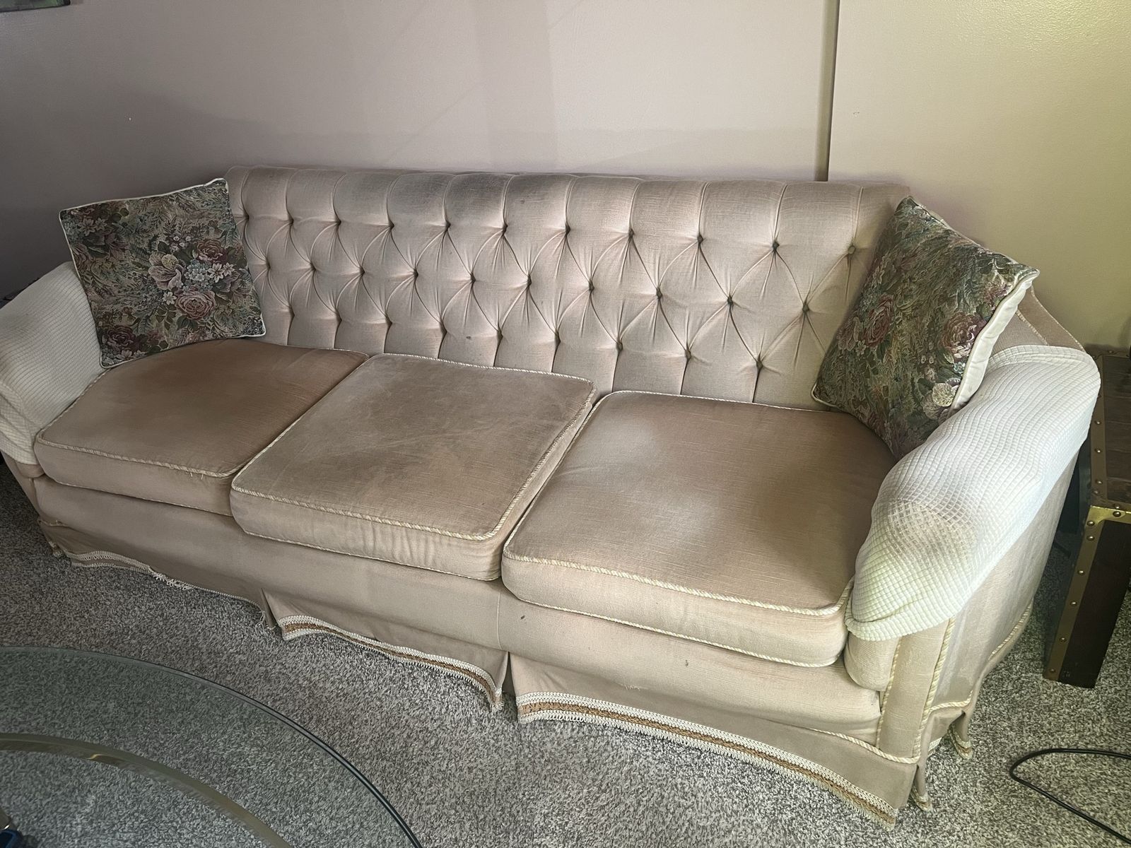 Free. Vintage Tufted Cream Fabric Sofa - 3 Seater with Skirted Base and Floral Accent Pillows