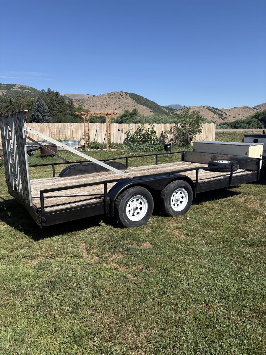 Dual Axle Utility Trailer with Ramp Gate and Wood Deck