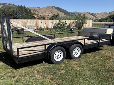 Dual Axle Utility Trailer with Ramp Gate and Wood Deck