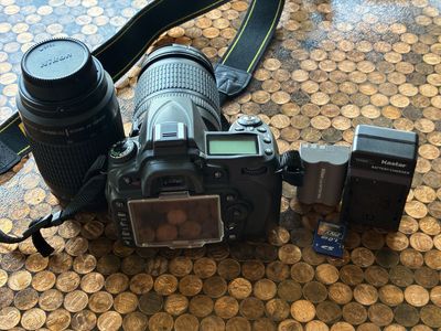 Nikon D90 DSLR Camera w/ Nikon DX AF-S Nikkor 18-105mm VR and Nikkor 70-300mm