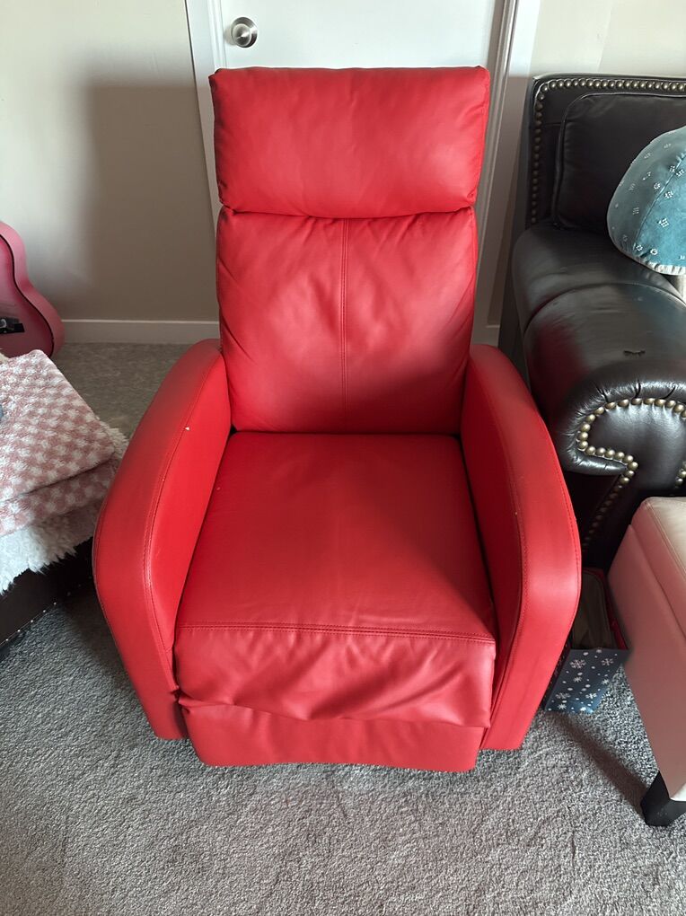 Two Red Reclining Chairs