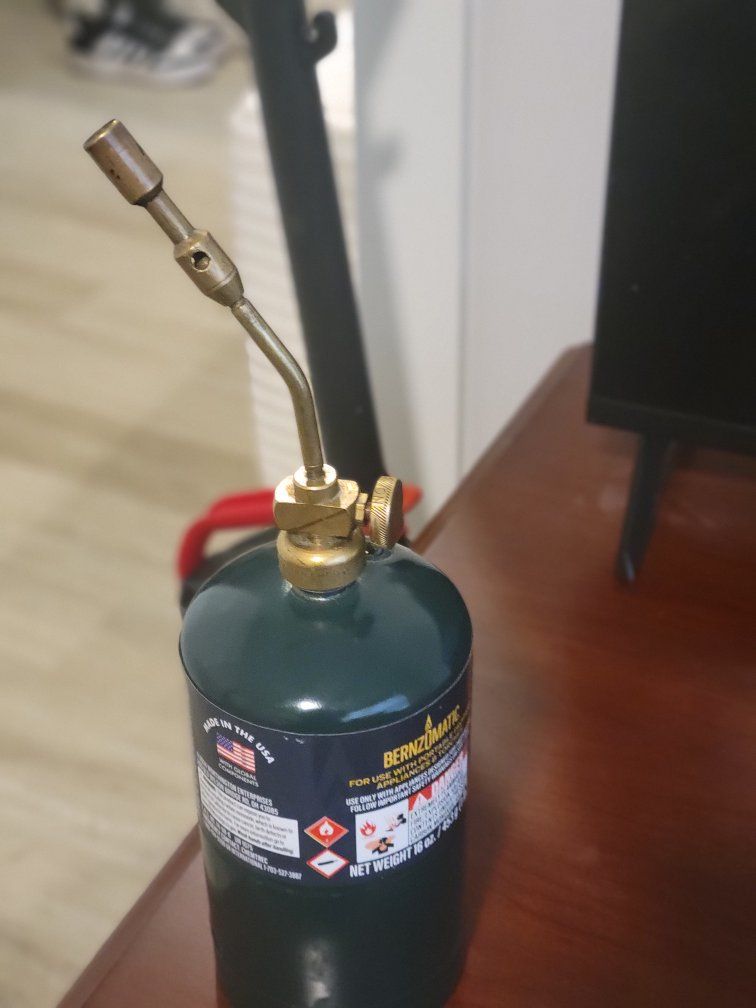 80% full Coleman propane torch with tip