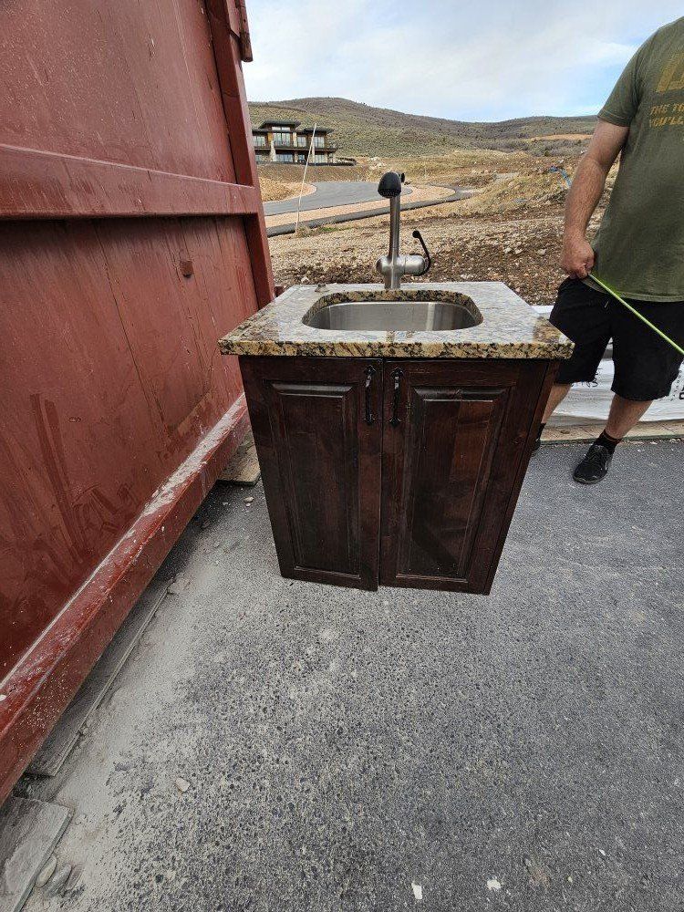 Granite sink with faucet and granite slab