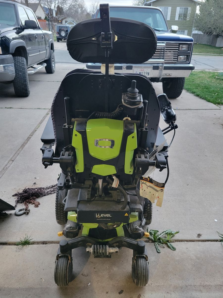 Raising electric wheel chair
