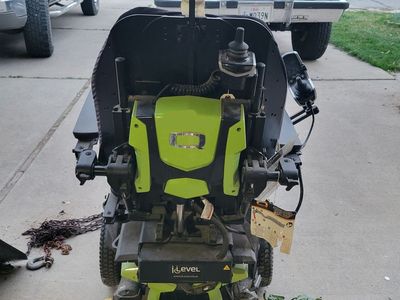 Raising electric wheel chair