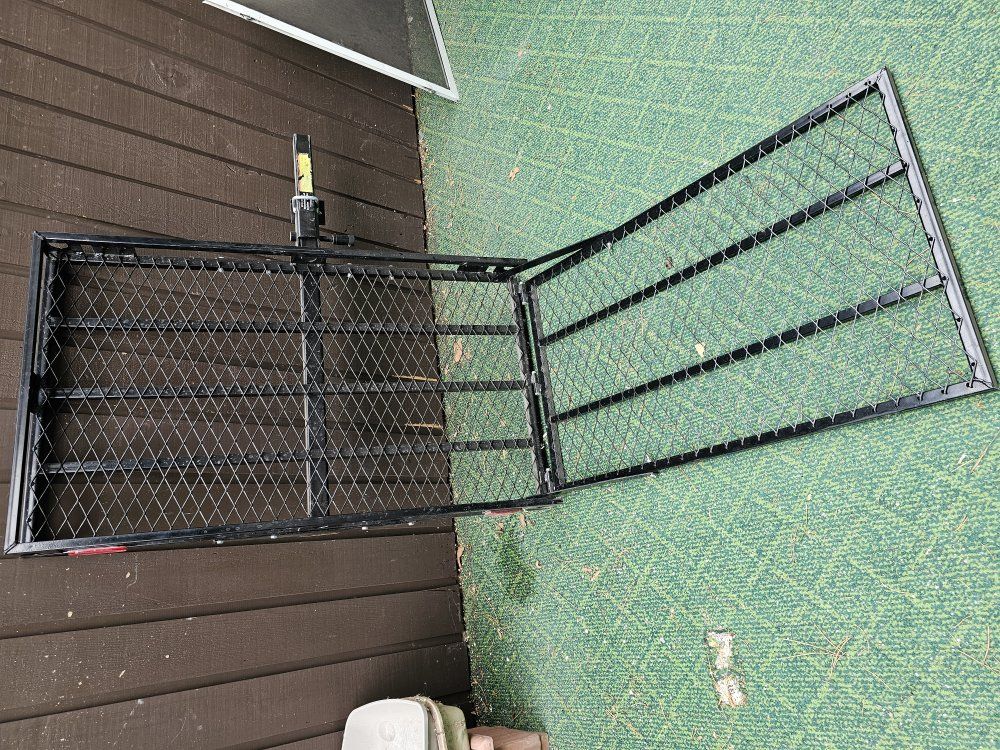 Itch foldable cargo carrier with ramp