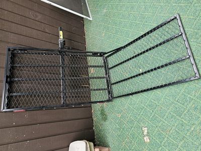 Itch foldable cargo carrier with ramp