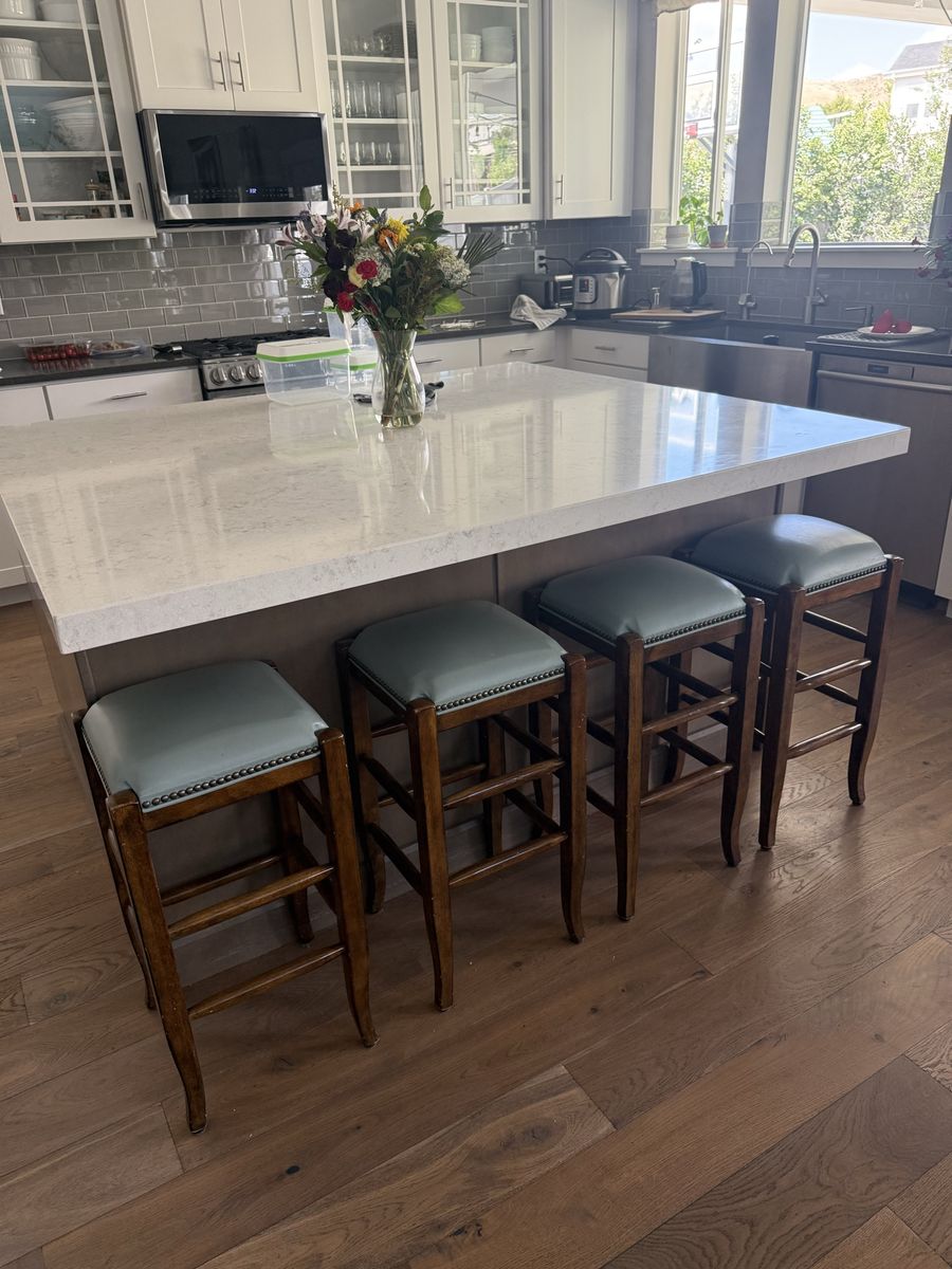 Pottery Barn- Set of 6 Wood Counter Height Bar Stools with Green/Blue Upholstered Seats and Nailhead Trim.