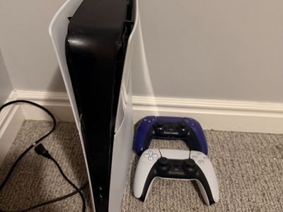 Sony PlayStation 5 Console with Two DualSense Controllers (White and Purple)