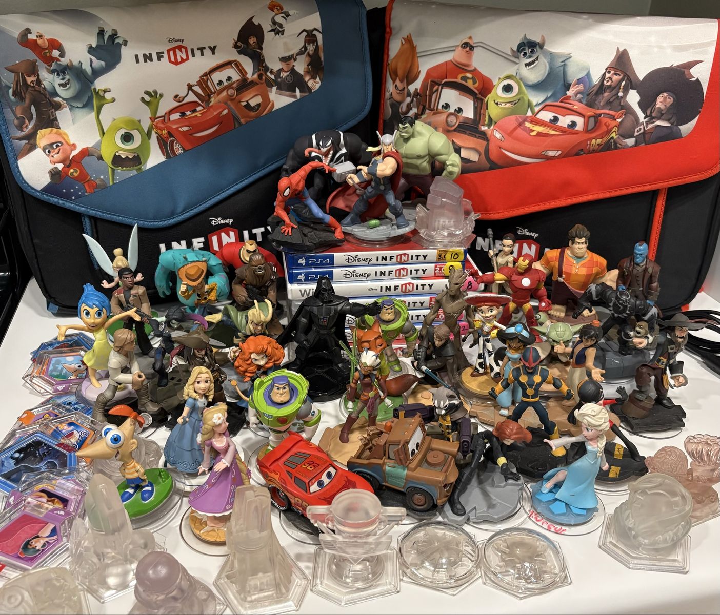 Disney Infinity Figures, Power Discs, Games, and Storage Bags