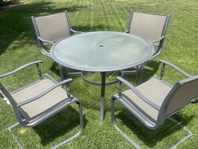 Great Patio Set! Round table and 4 rocker chairs
