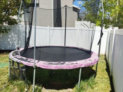 Skywalker 12 ft Round Trampoline with Enclosure Net - Pink/Black Outdoor Fun