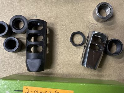 Muzzle brakes and thread protectors.