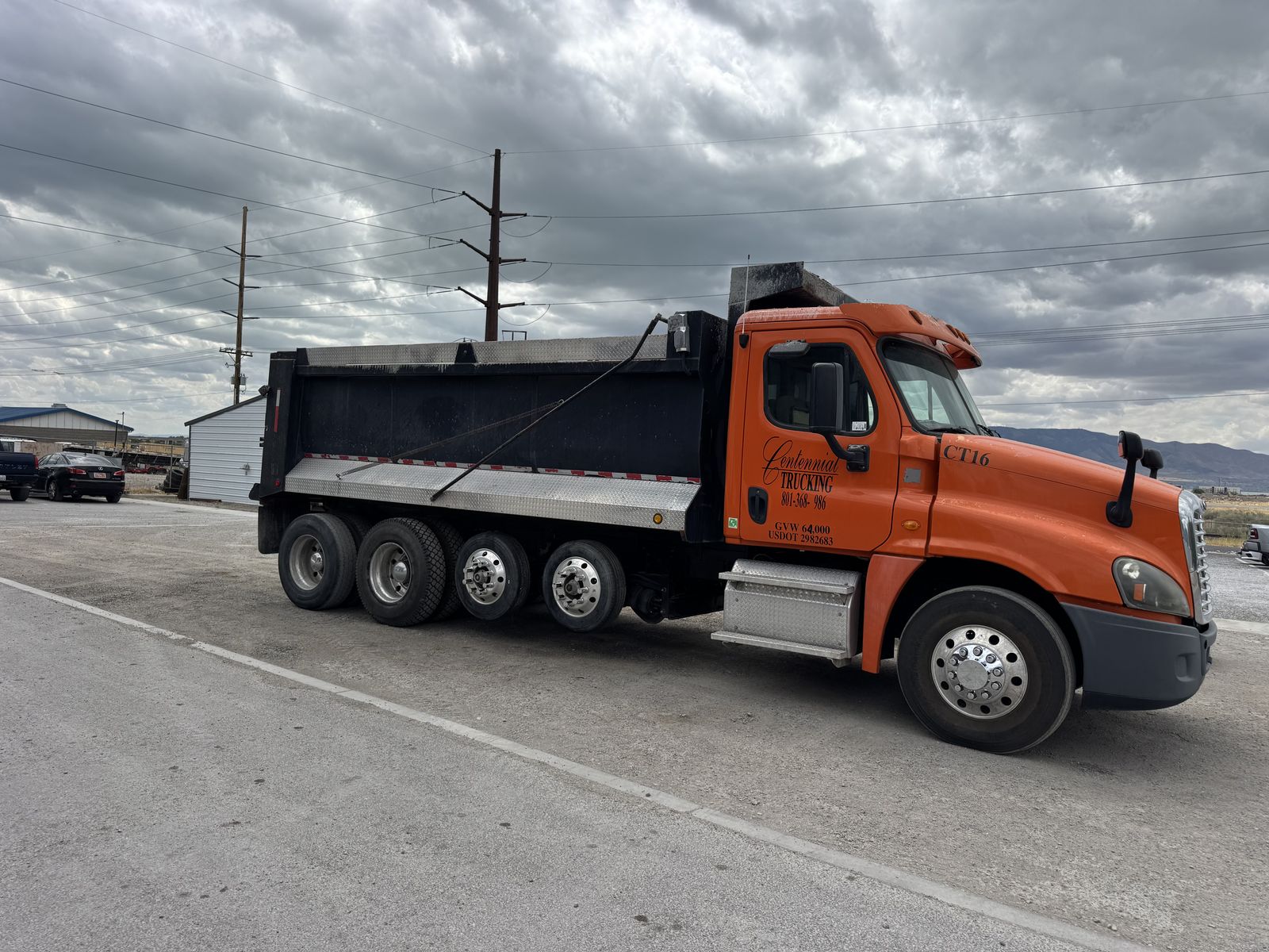 2016 Freightliner 5-axle dump truck with rock bed