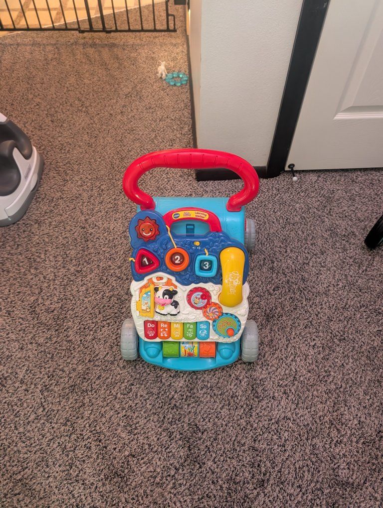 VTech Sit-to-Stand Learning Walker - Multicolor Interactive Baby Walker Toy