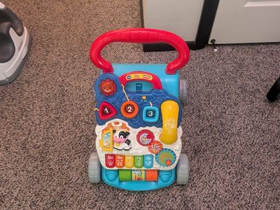 VTech Sit-to-Stand Learning Walker - Multicolor Interactive Baby Walker Toy