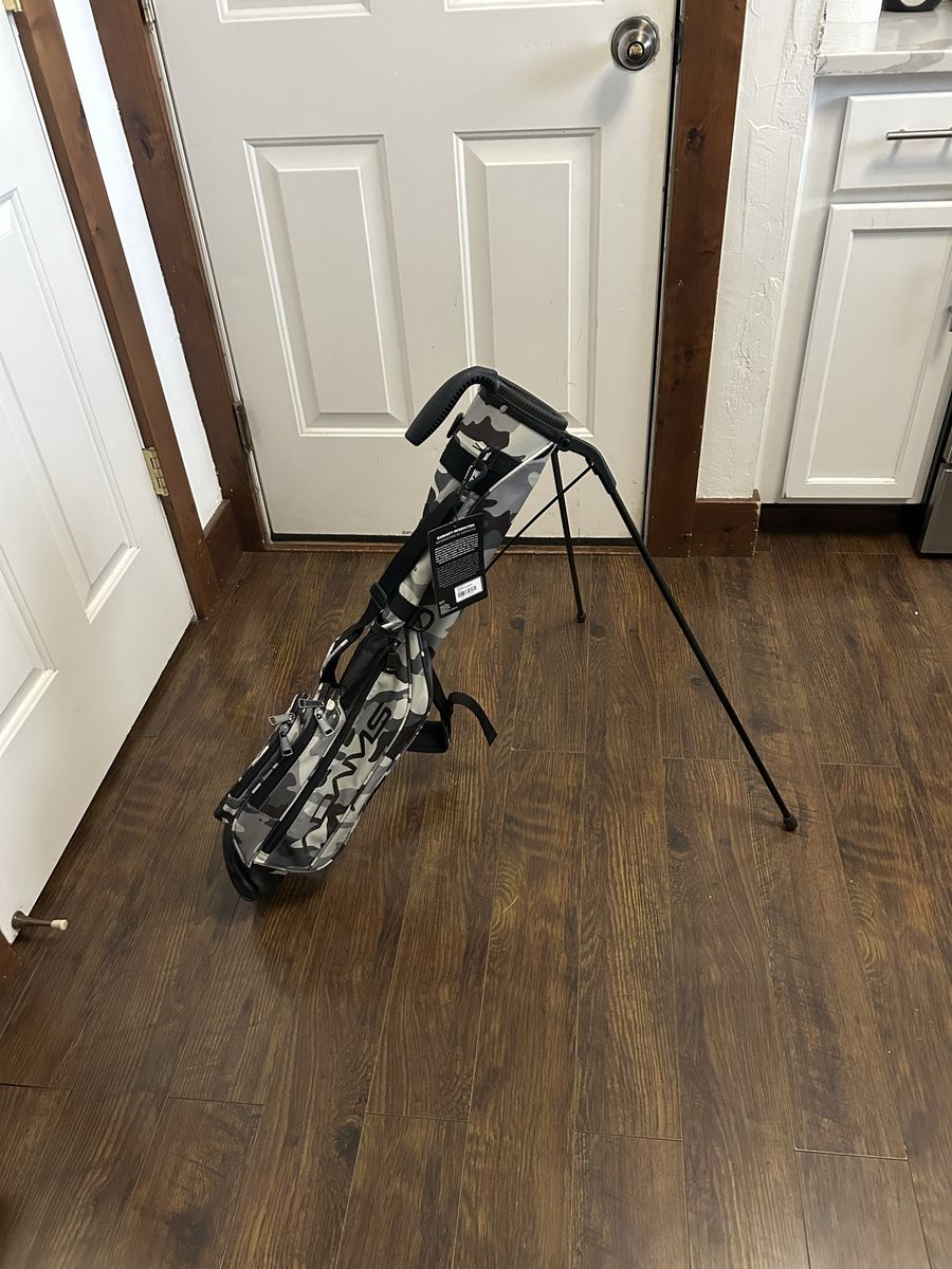 Adam’s golf range bag