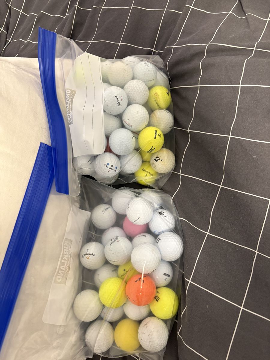 70 used golf balls