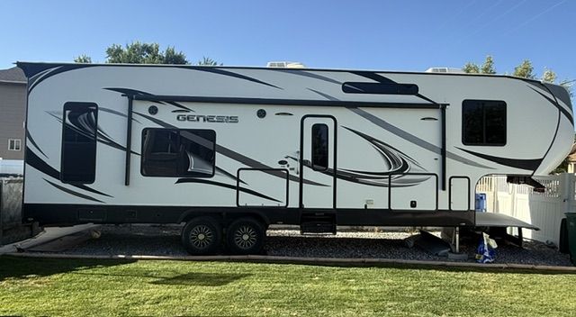 Genesis Supreme 34GS Travel Trailer Toy Hauler - Spacious, Modern Interior