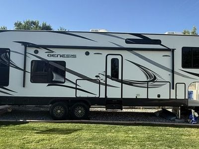 Genesis Supreme 34GS Travel Trailer Toy Hauler - Spacious, Modern Interior